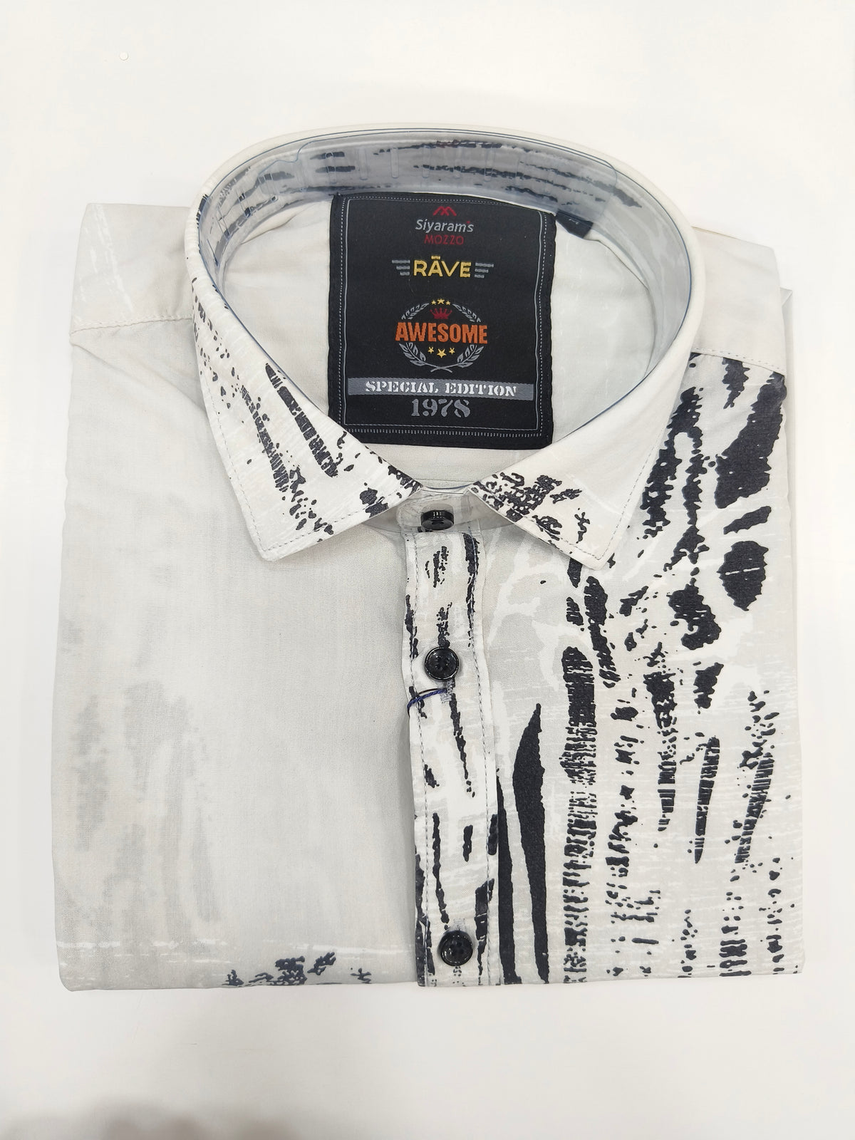 Siyaram’s Mozzo Rave Men’s Printed Shirt – White with Black Abstract Design