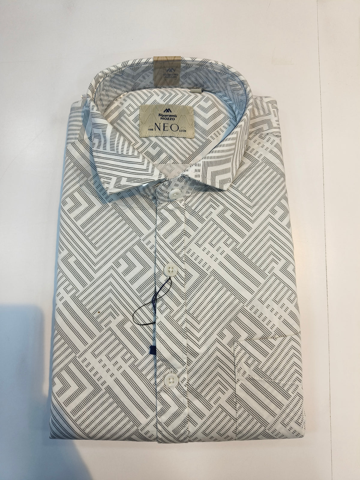 Siyaram’s Mozzo Neo Look Men’s Geometric Printed Shirt – White & Black