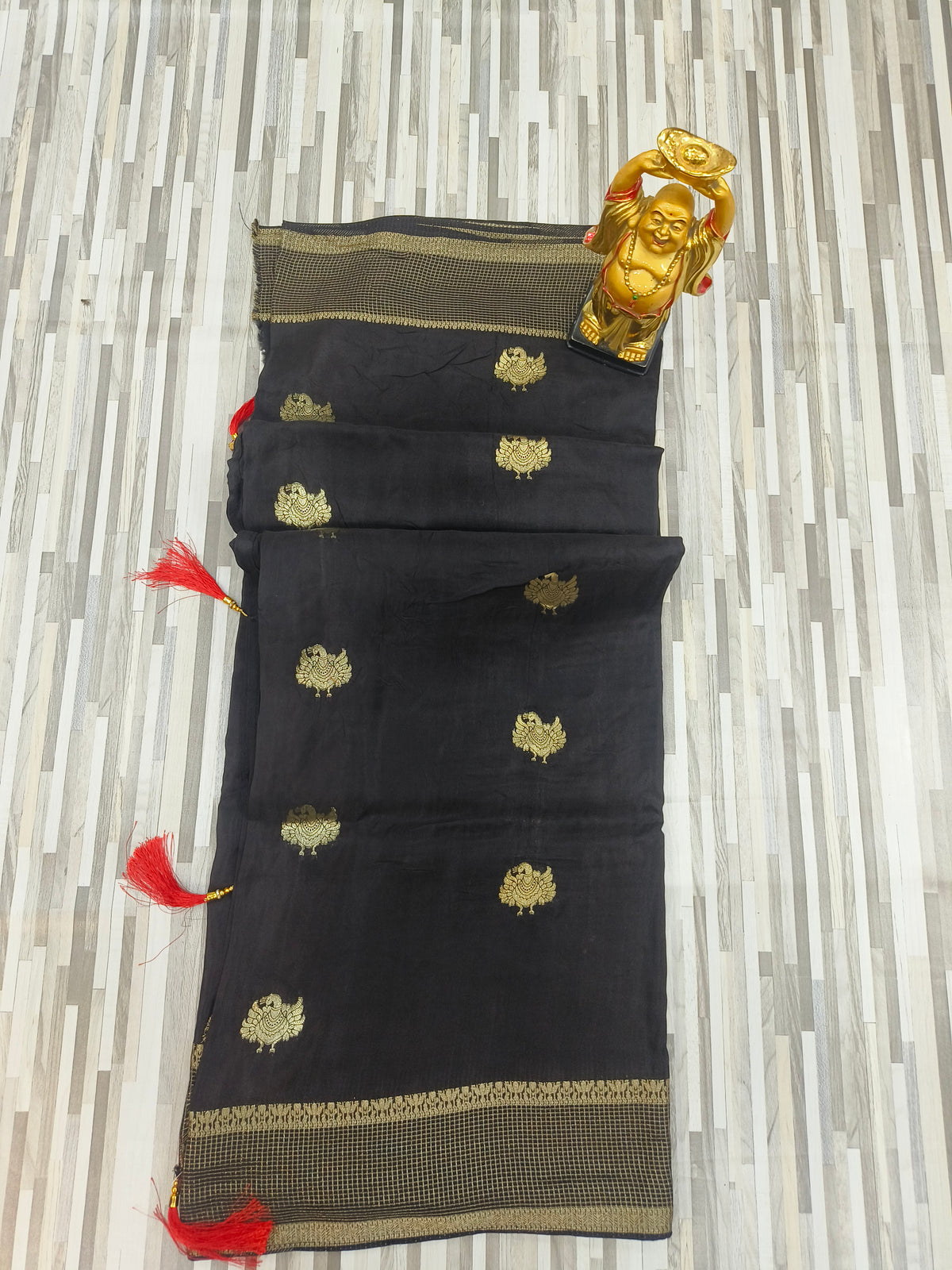 Elegant Black Saree with Golden Butta & Zari Border
