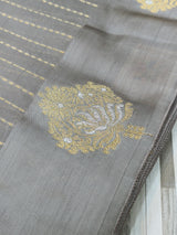 : Elegant Gold Butta Saree with Striped Design